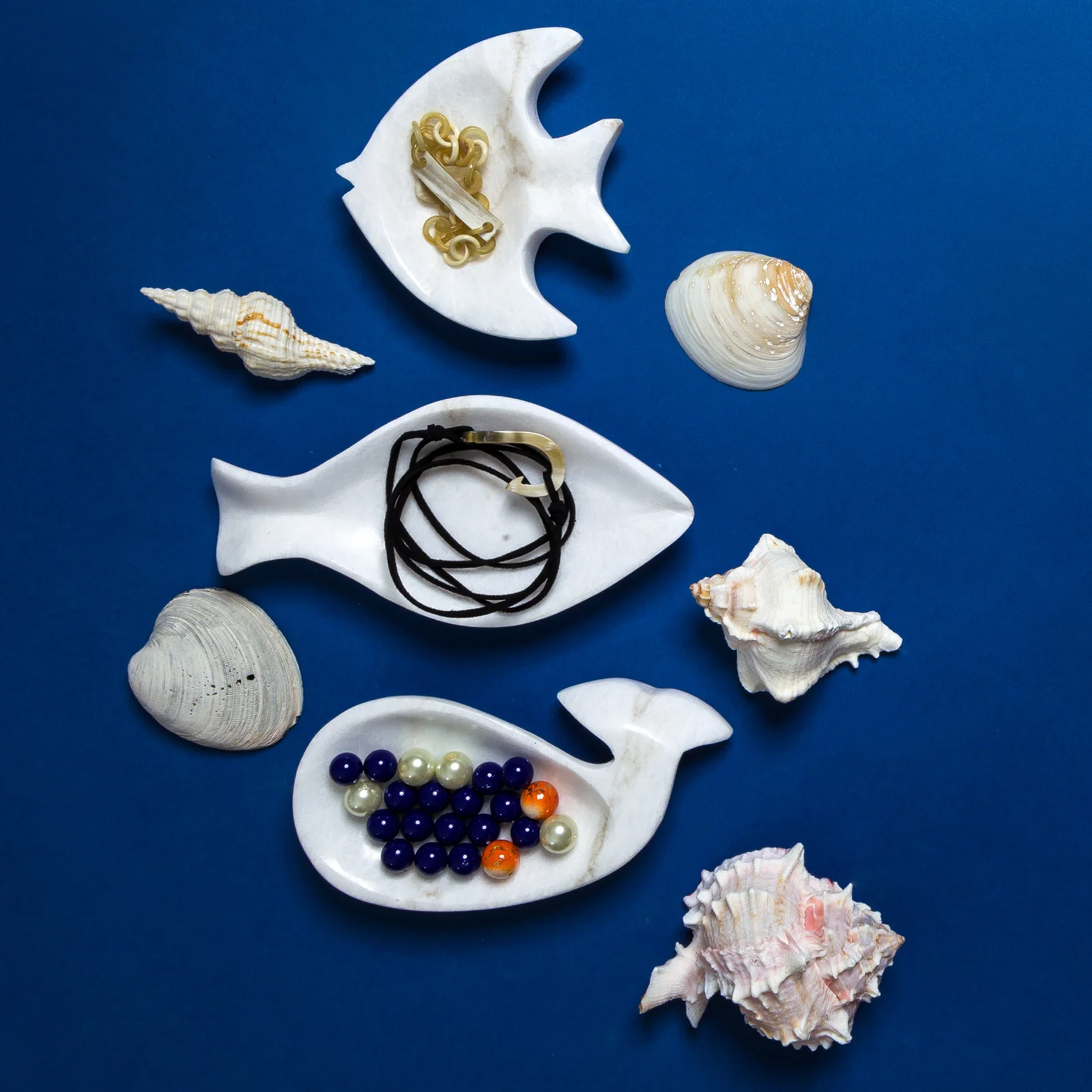 ALABASTER Hand Carved alabaster dishes serve as the perfect vessels for soap, jewelry, or other trinkets. Pure white in color, they work as a wonderful accent in the bath.