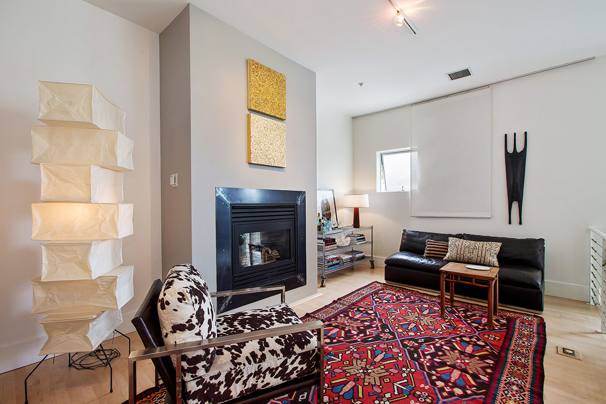 A young, well-traveled couple puts down roots in a live/work loft, right in the heart of a tech-centric urban neighborhood. The open space plan on three levels allows for flexible work spaces and provides groupings for conversations, meetings and entertaining. Open Homes Photography
