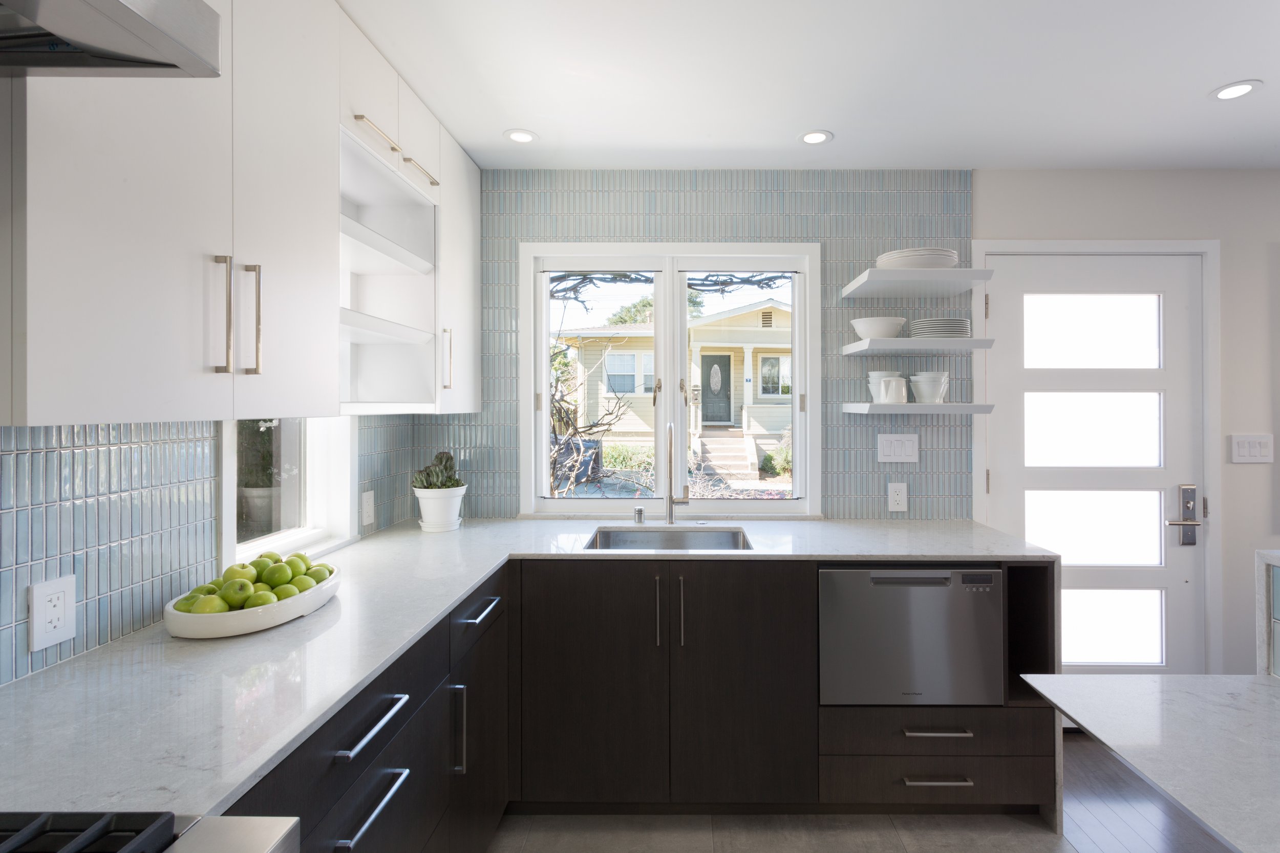 At just 900 square feet, this tiny house project offered new challenges in design. The puzzle was to find a place for everything, and still make the home feel fresh and open. We provided easy access to all the amenities, though when not in use, the