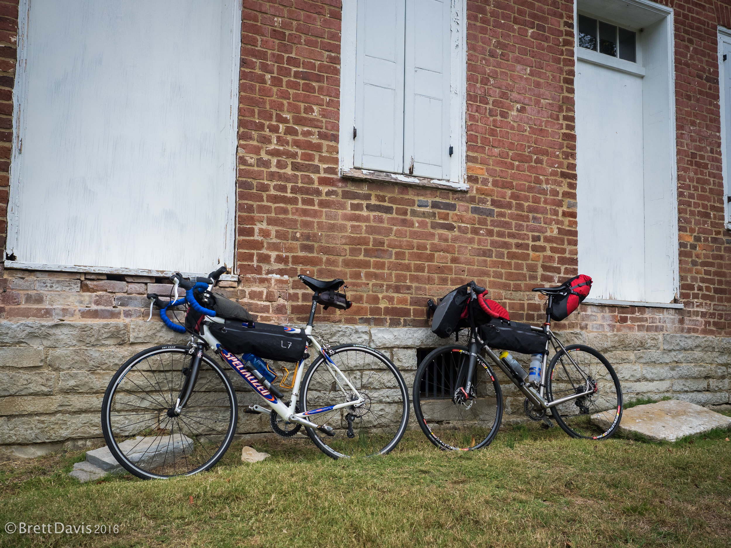 Our trusty steeds getting some rest against one of the old brick walls of the Gordon House.