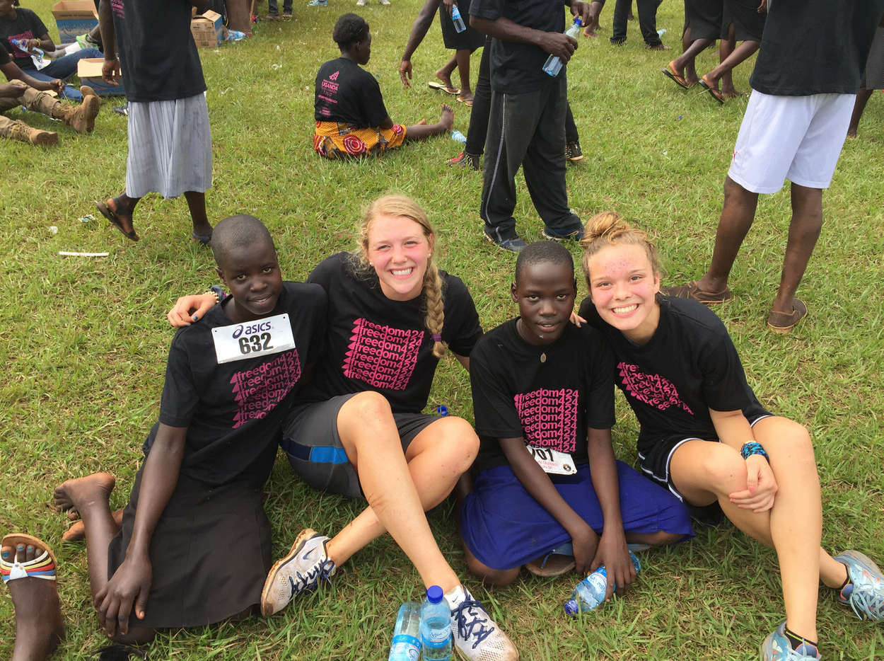 Another trip member Grace Hildebrand and I with Constance and her friend who also ran in Run 4 Their Lives Uganda.