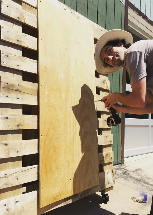 Ethan building our taproom, 2018.