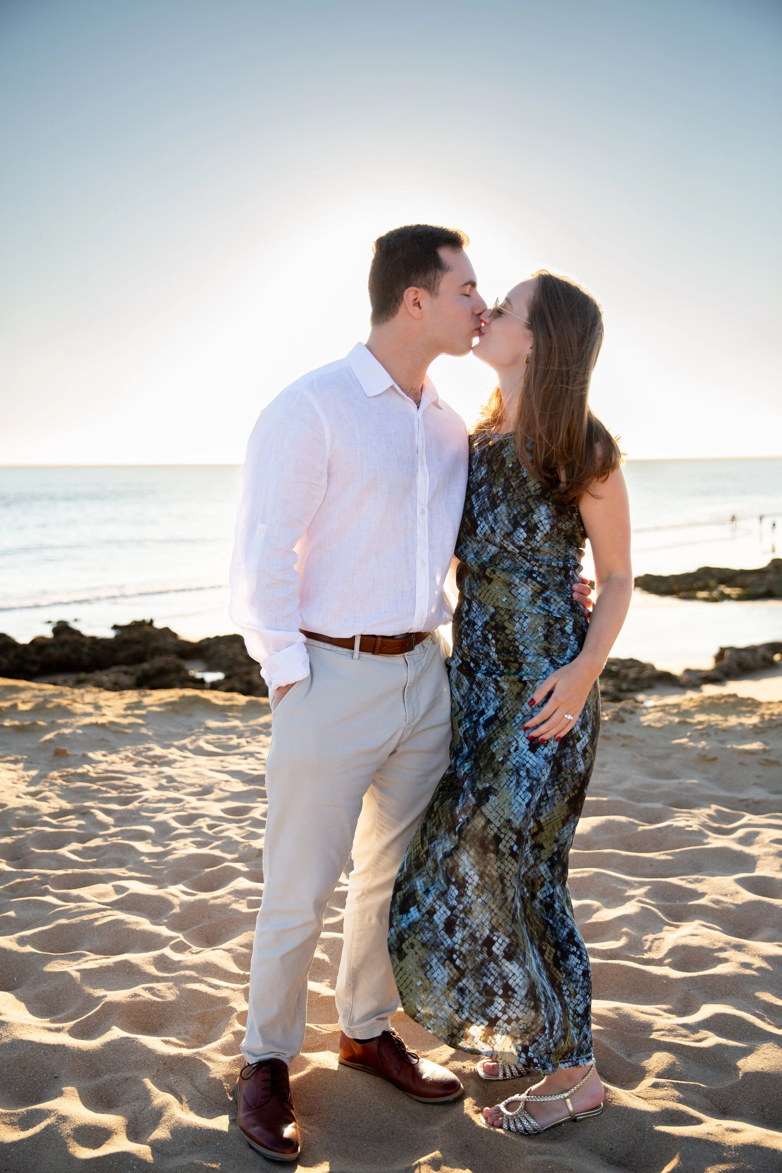 Romantic Oeiras beach engagement session at Praia do Moinho during sunset.