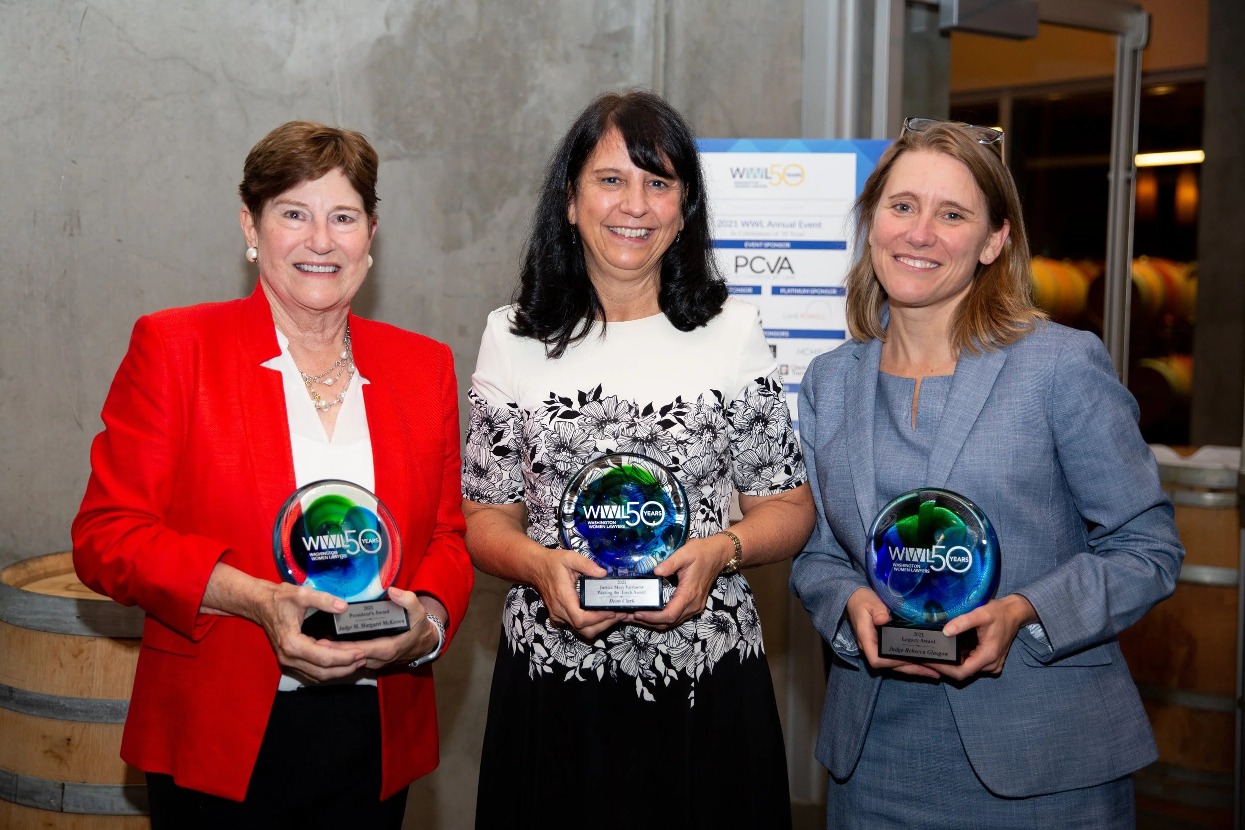 Professional corporate event photography in Lisbon, Portugal, capturing women lawyers gathered for a professional event and award ceremony. This image highlights the achievements, leadership, and accomplishments of women in the legal profession.