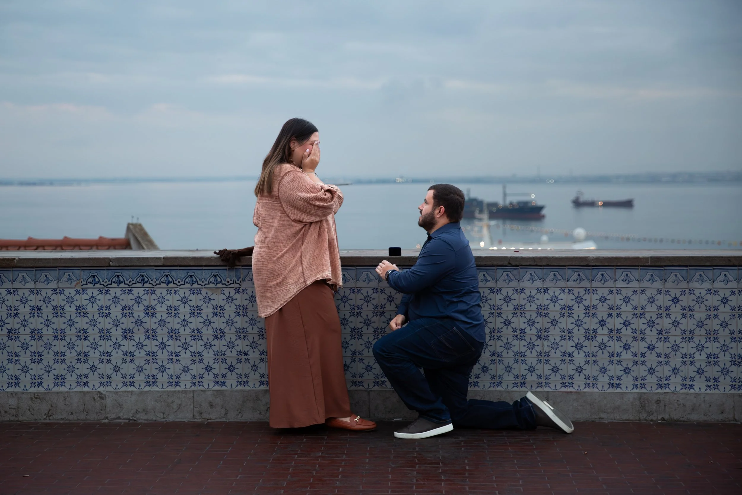 Romantic Lisbon proposal at the Praca de Santa Luzia at sunrise in Alfama.