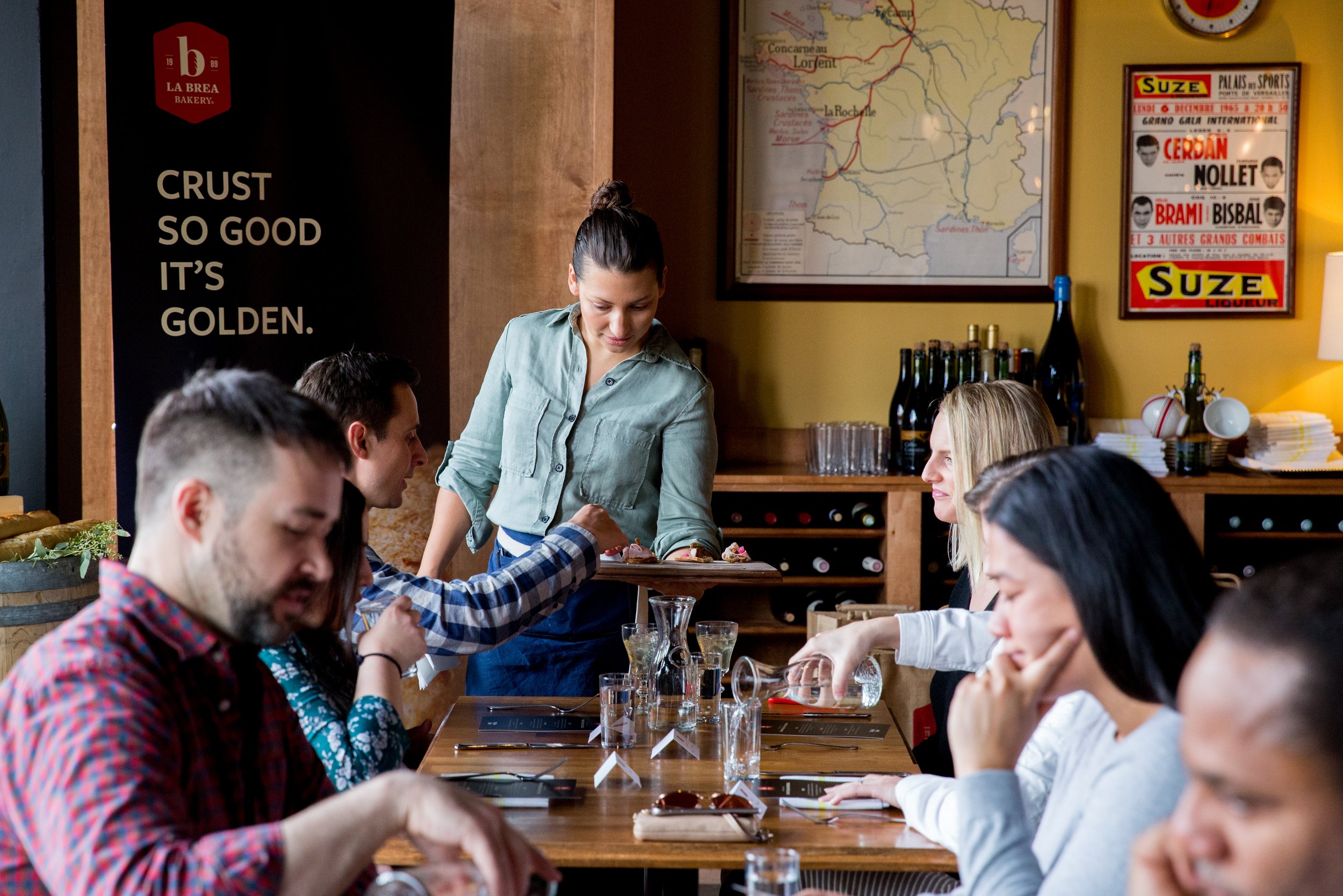 Professional food event photography in Lisbon, Portugal, capturing candid photos at the event hosted by a restaurant. From wine tastings, food pairings and brand experiences to social gatherings and celebrations, this image showcases the atmosphere a