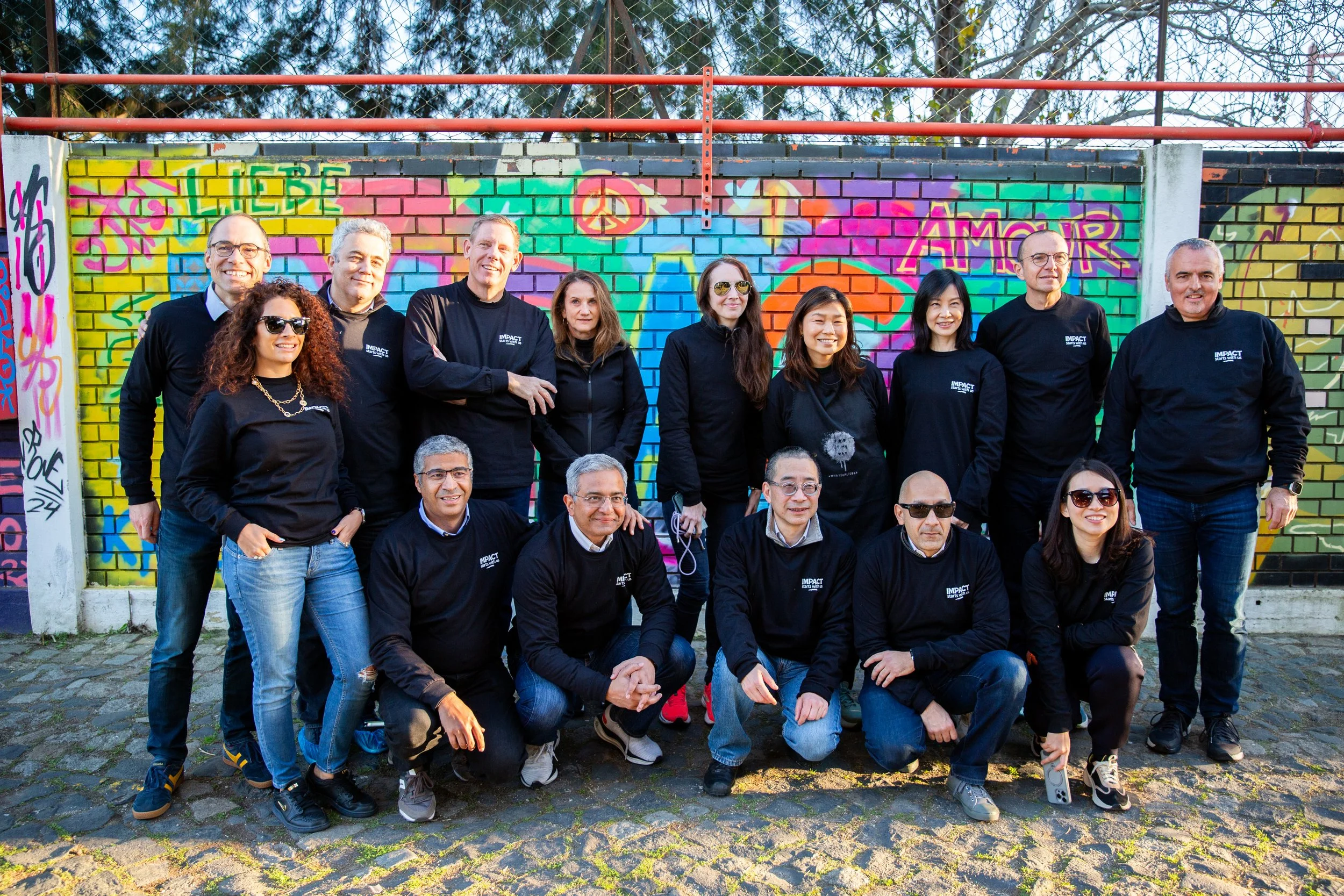 Corporate team-building event photography in Lisbon featuring employees learning how to create graffiti art together. From creative workshops to collaborative activities, professional photography captures the energy and connection of memorable compan
