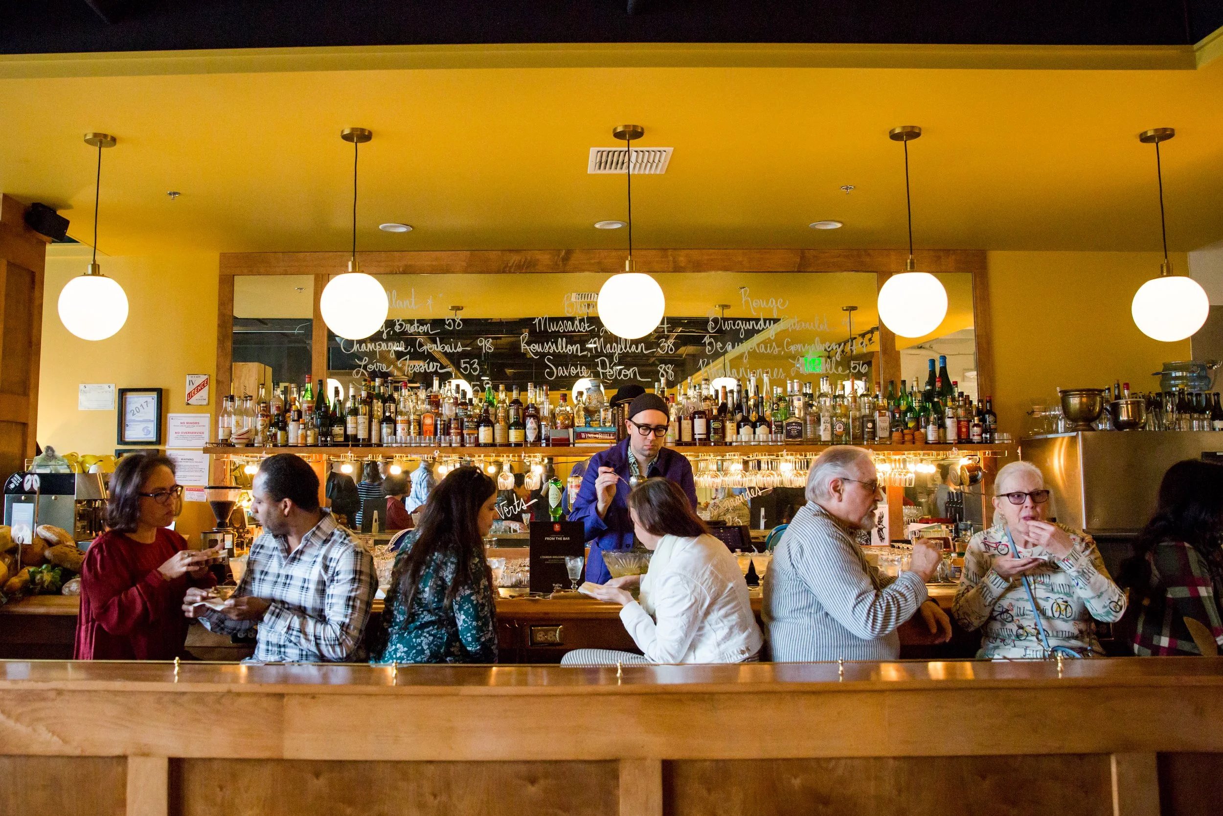 Professional food event photography in Lisbon, Portugal, capturing candid photos at the event hosted by a restaurant. From wine tastings, food pairings and brand experiences to social gatherings and celebrations, this image showcases the atmosphere a
