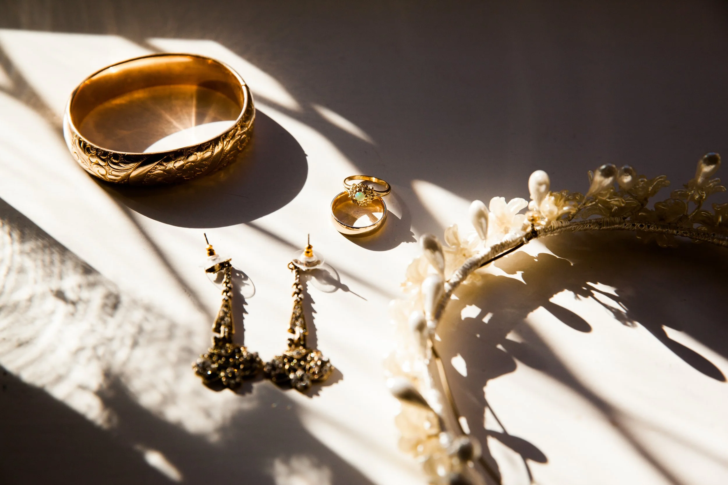 Wedding jewelry details in beautiful lighting, at a wedding in Lisbon.