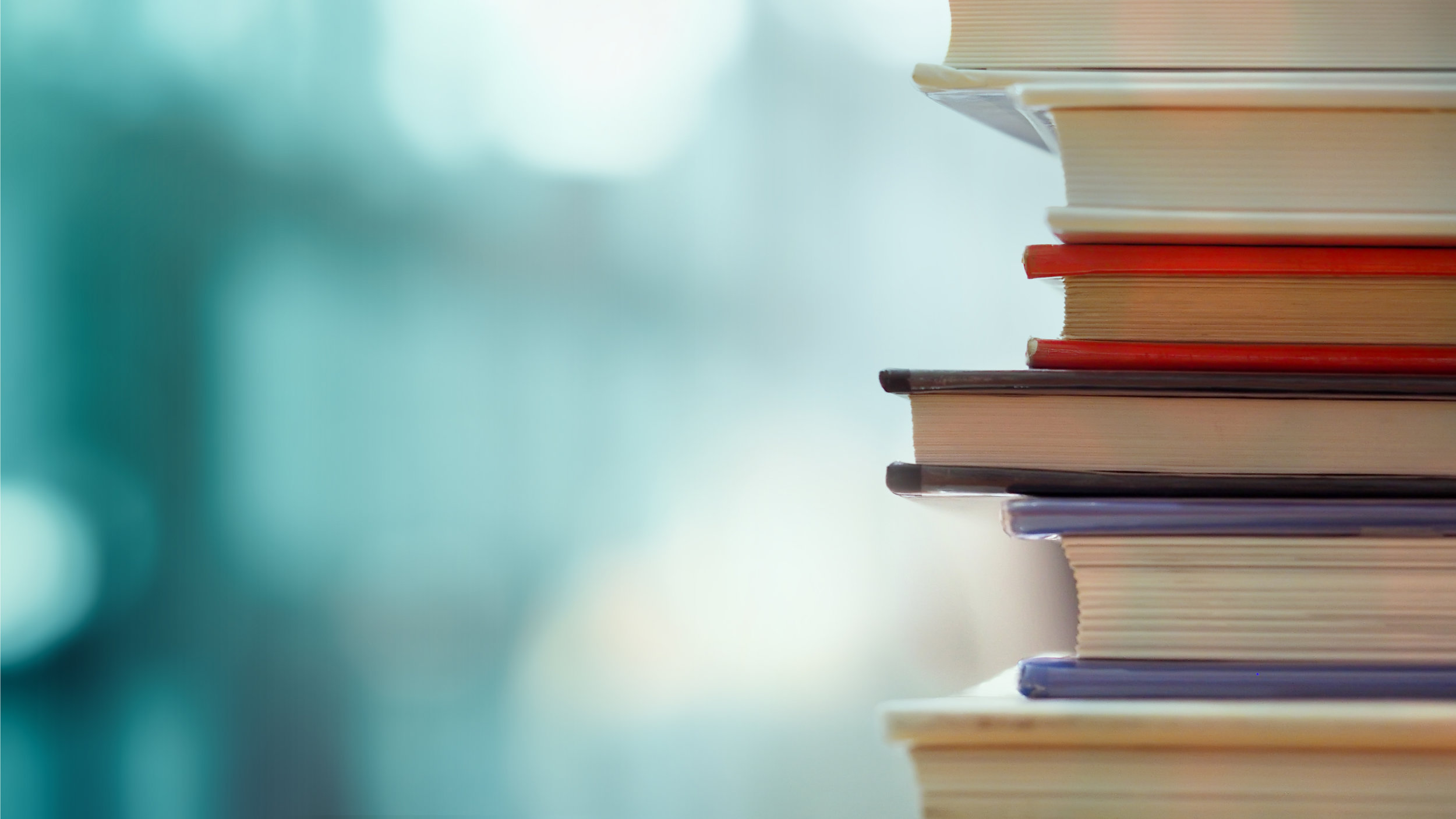 shutterstock_621157613 - book stack.jpg