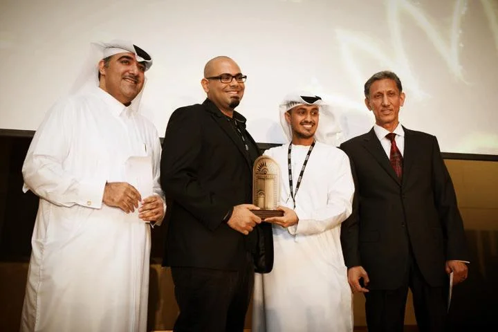 Ray Haddad and Rafed Al Harthi accept award for Best Short Documentary @ Abu Dhabi Film Festival 2013