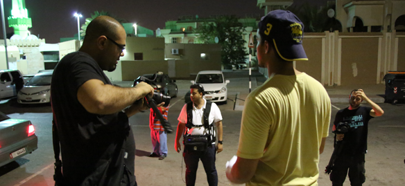 Ray Haddad and Rafed Al Harthi wait for character and discuss next scene in Feeding Five Hundred