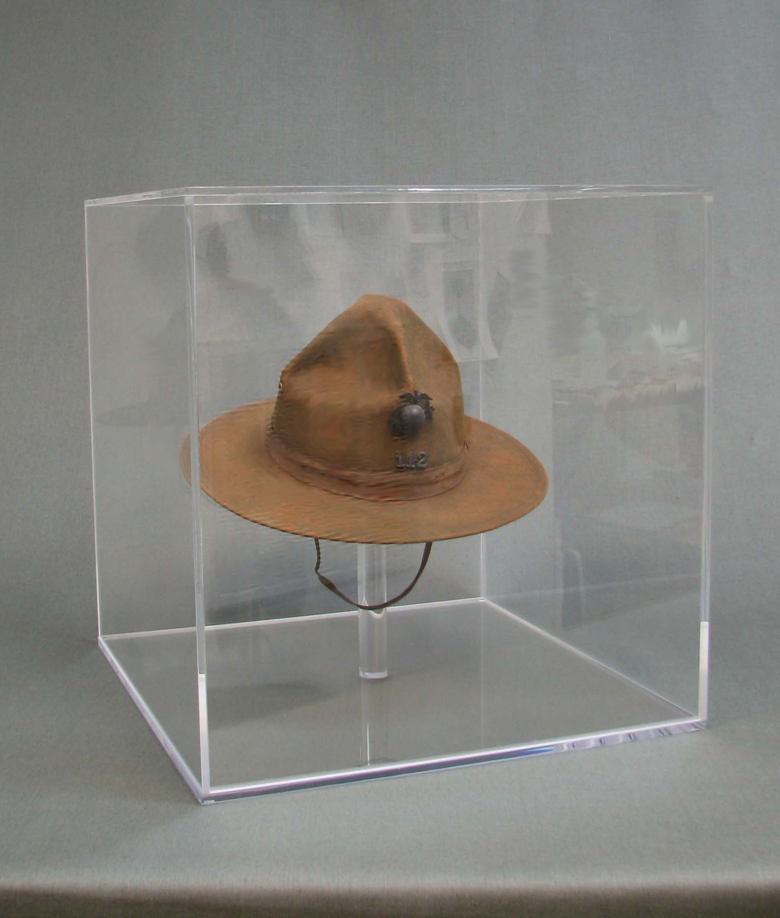 WWII Campaign Hat. Cleaned, interior support added and encased in UV filtering acrylic box.