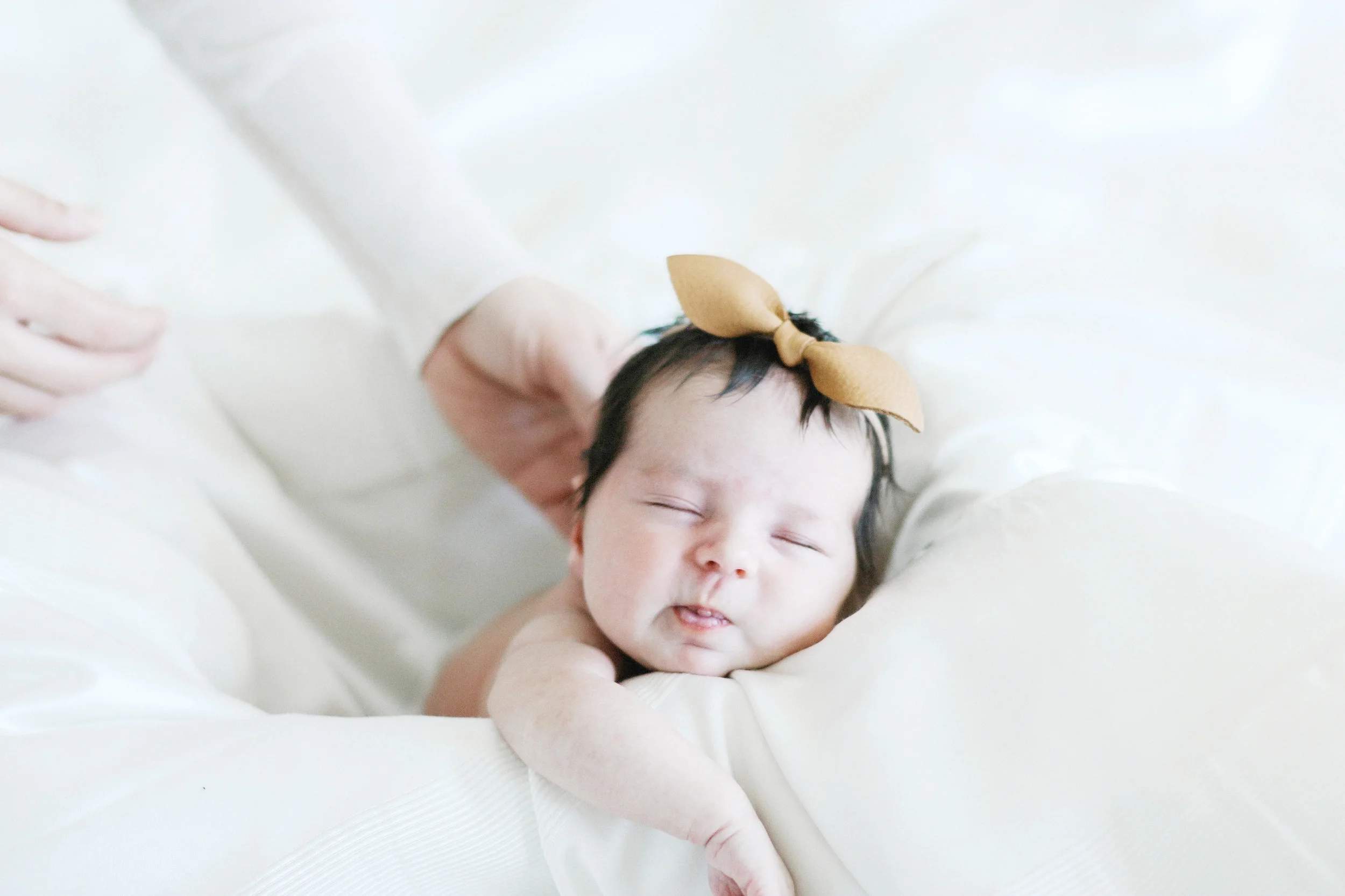This was my first newborn shoot ever and it was the sweetest thing. The Martine's have the most beautiful home and it was so kind of them to invite me to be a part of their first newborn shoot, as well! I think I found a new favorite photography subject: babies! Reese is so sweet and I learned she loves to have her hand in her mouth. She was such a laid back baby and made some of the cutest faces! I've got to tell you, friends, from a maternity shoot in February to this newborn shoot in March... the baby fever is REEAALLLLL! Check out more sweet photos below!