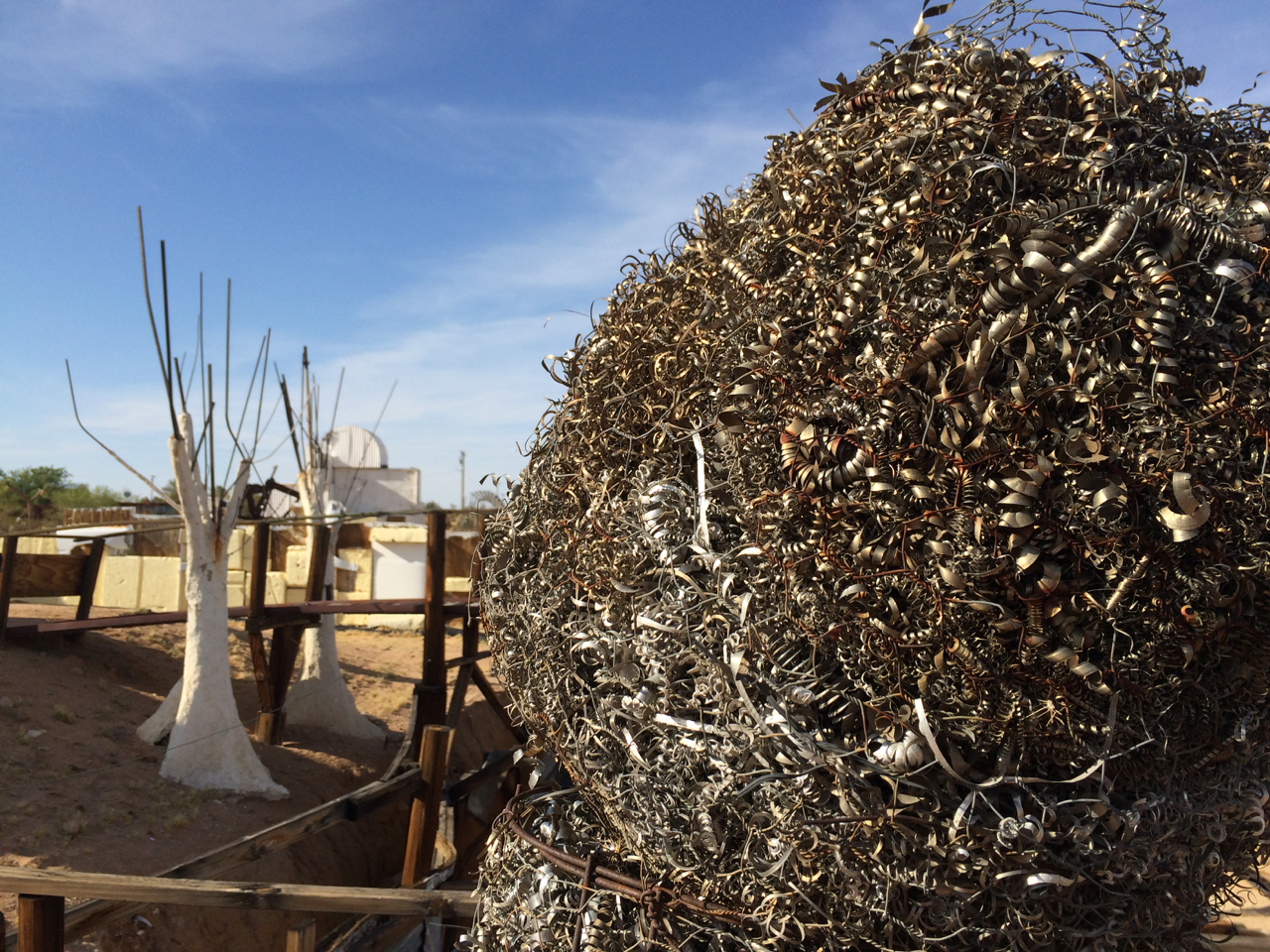 the site was underwhelming at first, looking like any number of misguided efforts at desert building that turn into junk at the first wind storm.