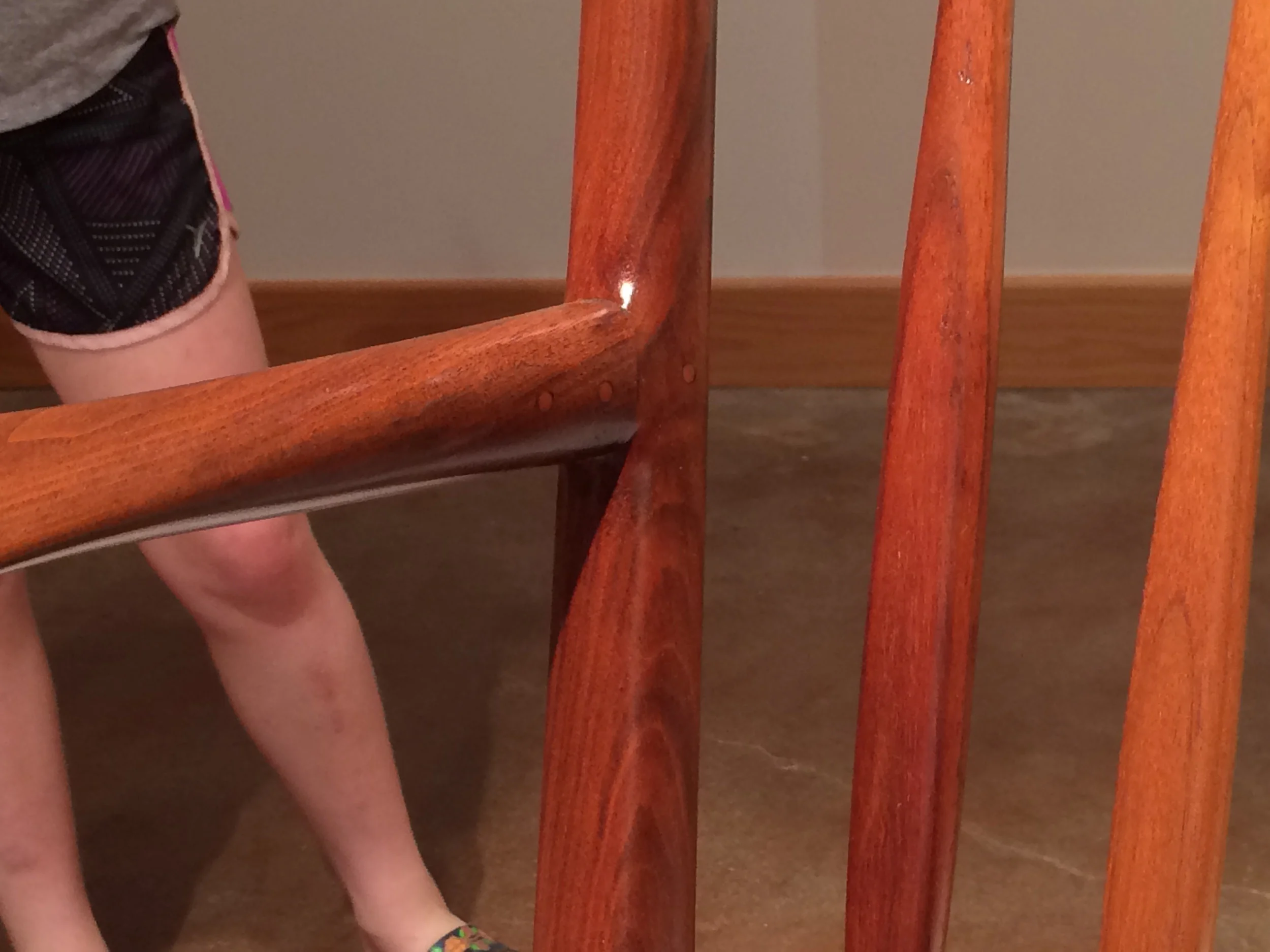 a close up of the arm/back joint from his early chair. Maloof's joints became more elaborate not for their own sake, but as a way to lock the pieces together. obviously that had an aesthetic bonus as well.