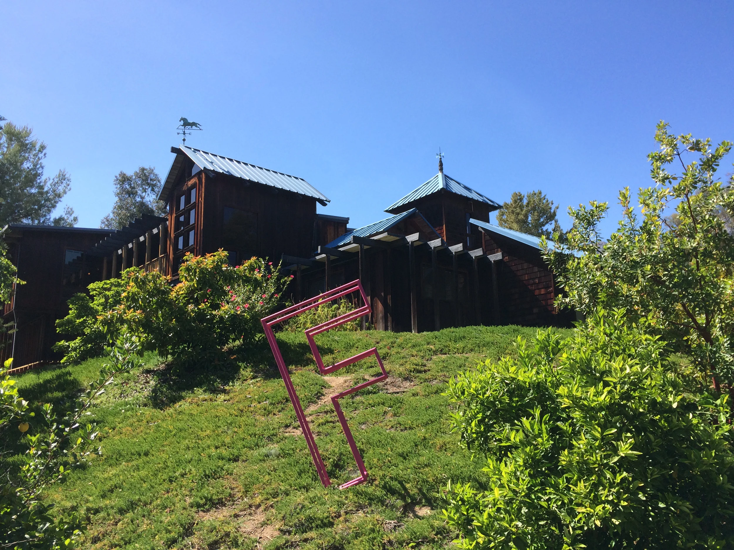 the extensive gardens, built on an old lemon orchard in the foothills of the San Gabriel mountains, are filled with art, and both they and the structures that frame them are playful and welcoming, inviting exploration