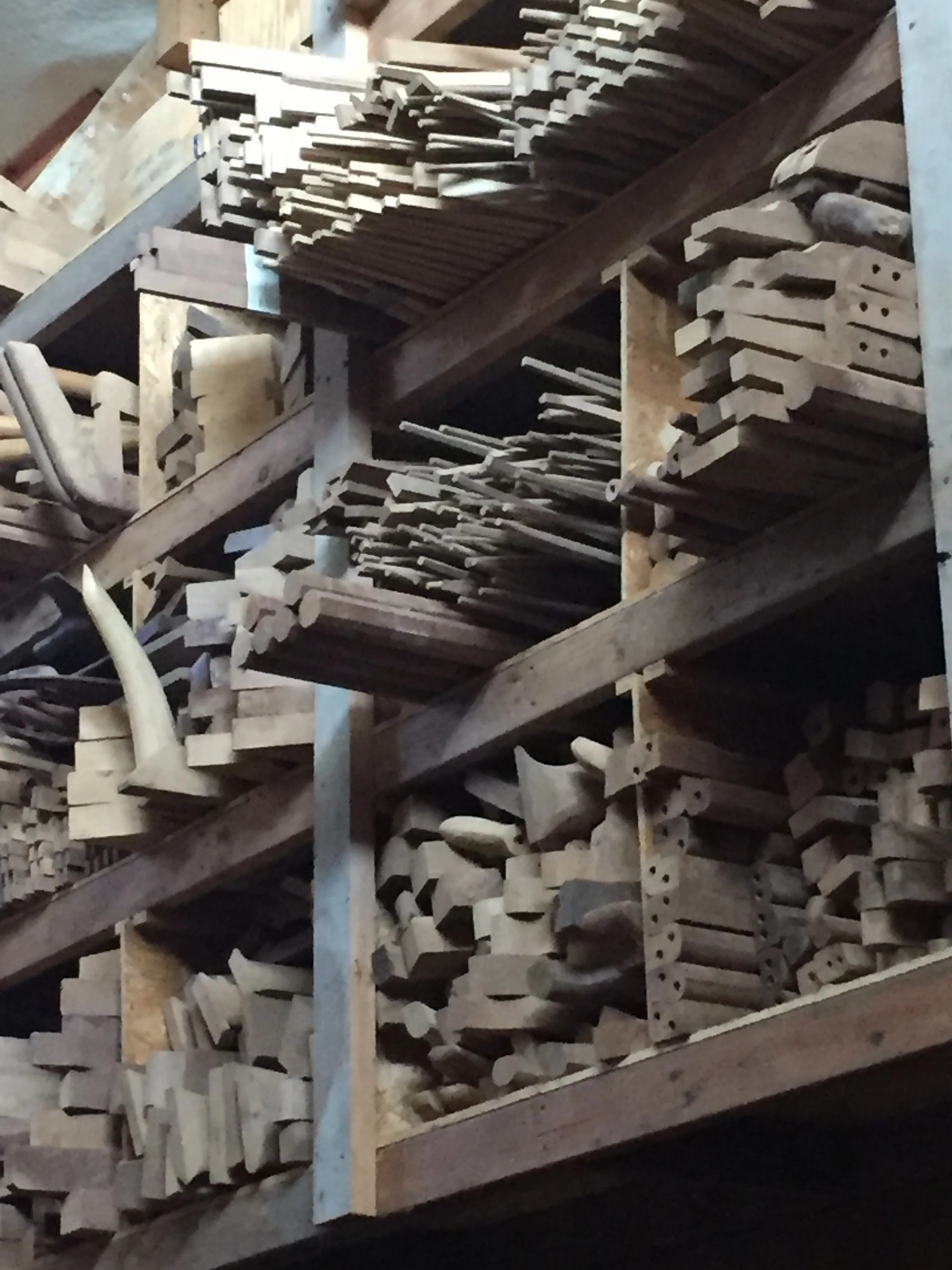 this is just catnip for woodworking types. Maloof had three sheds built on his site for rough wood storage and stockpiling parts. He's known for using predominantly Western black walnut, but there are all sorts of odd and exotic chunks stacked alluringly in the corners.