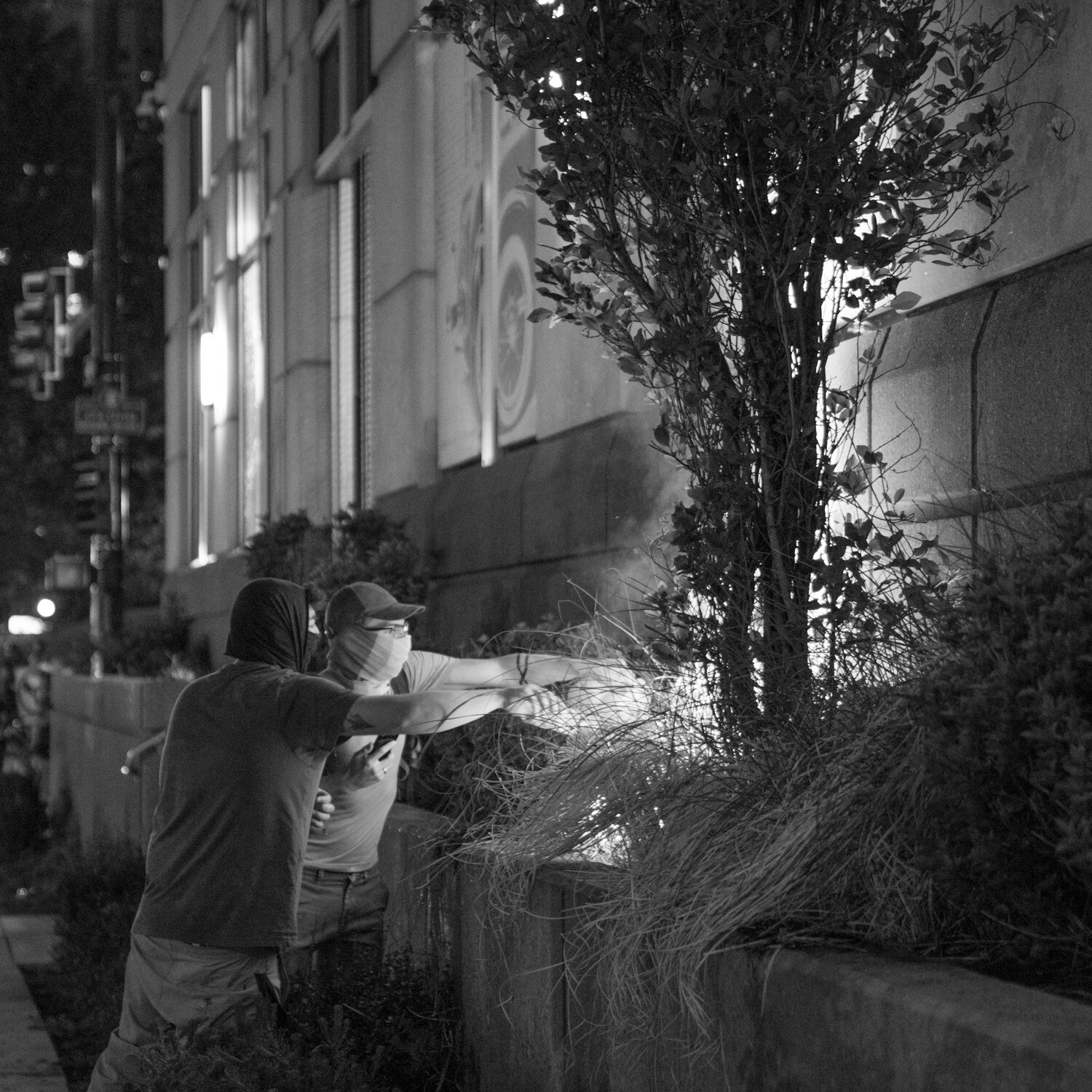 Two protesters put out a fire that was intentionally started just seconds beforehand. 5/29/2020.