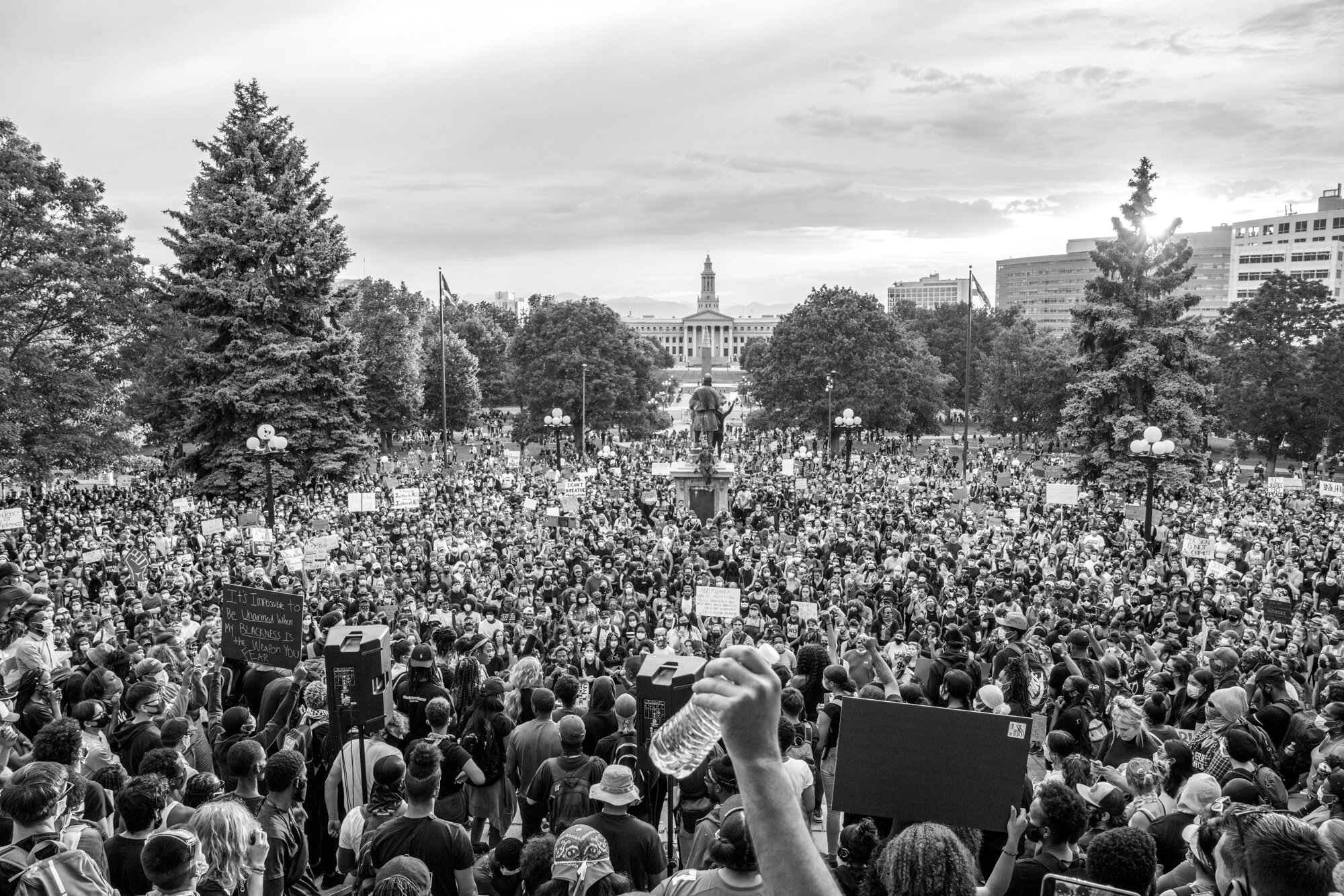 A large group of protesters outside of the Colorado State Capitol Building celebrate after a number of speakers concluded their talks. 6/01/2020.