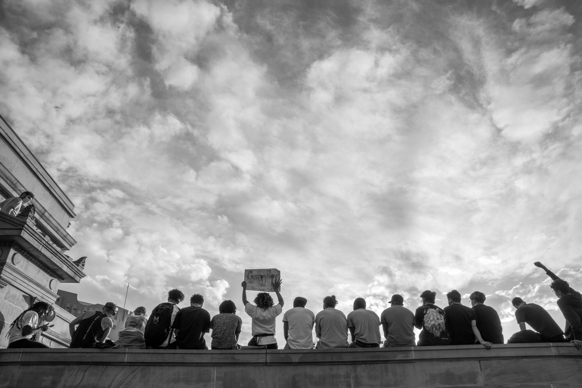 Protesters in Civic Center Park listen and watch different speakers from the top of a structure. 6/02/2020.