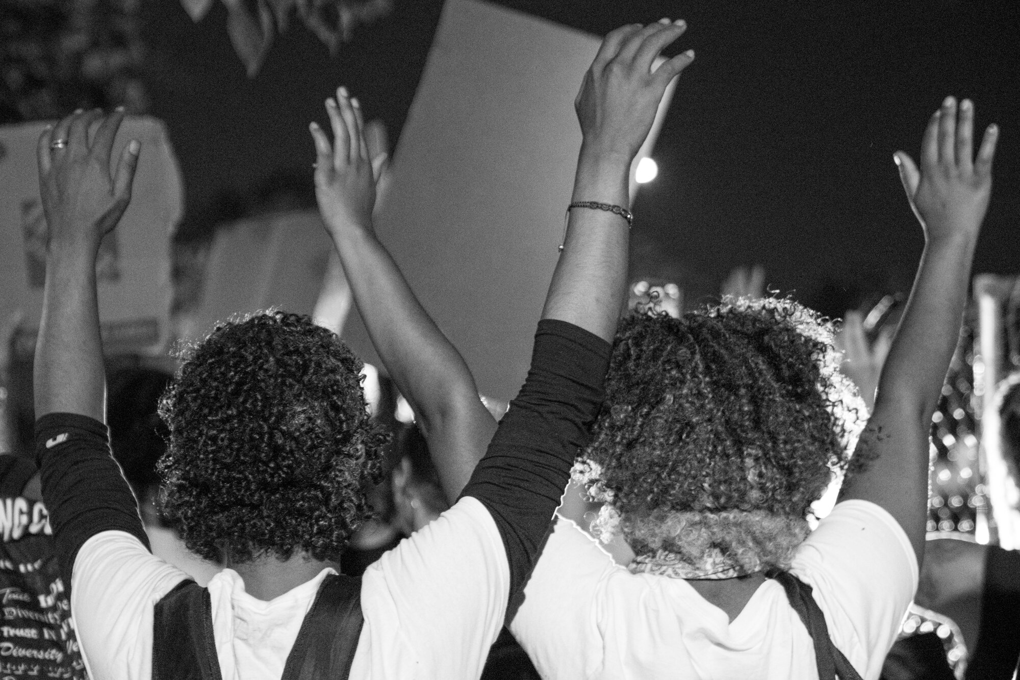 Protesters put their hands up outside of the police station. 6/02/2020.
