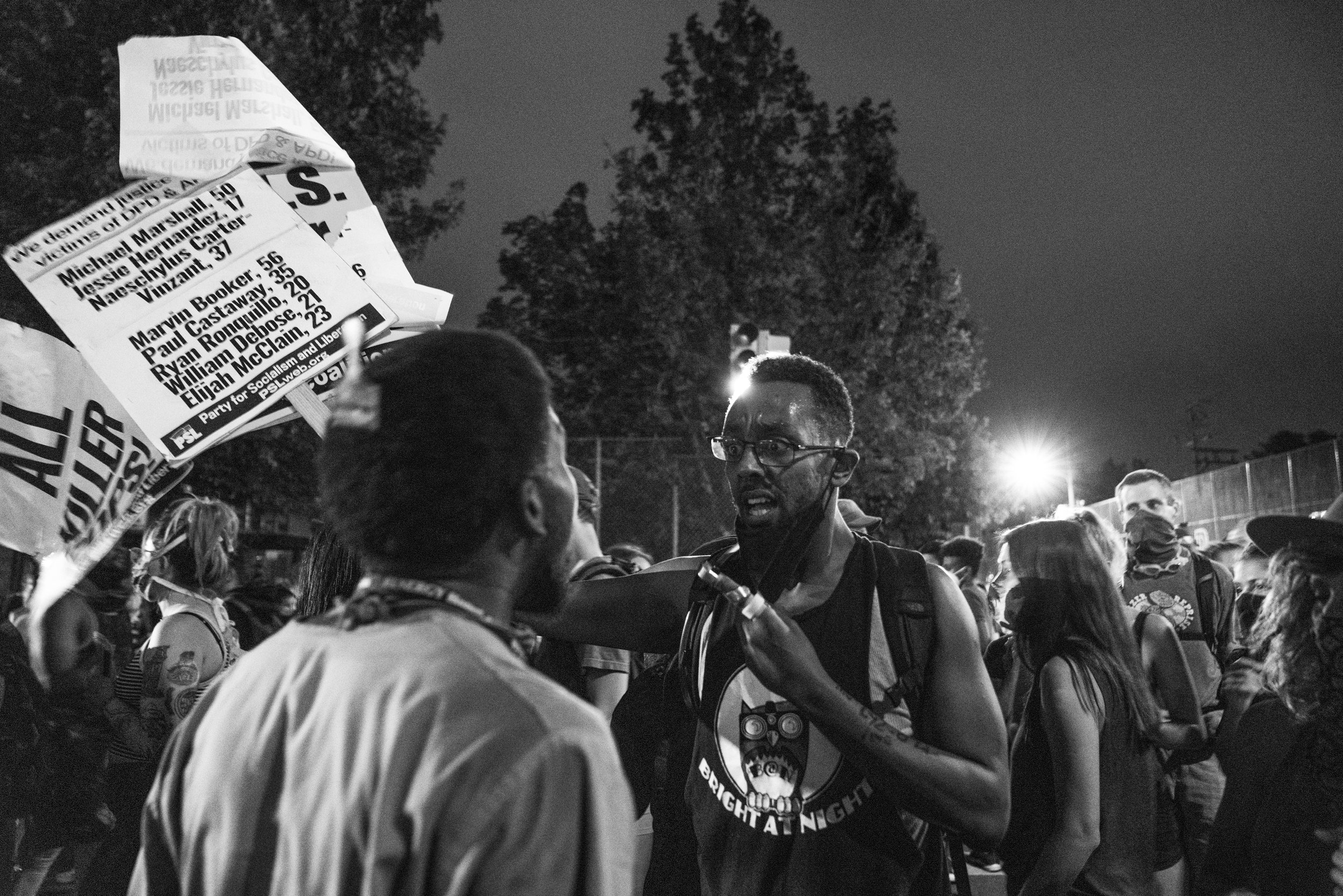 Protesters in the midst of a tense discussion about a potential march to the Denver Police Station. 6/02/2020.