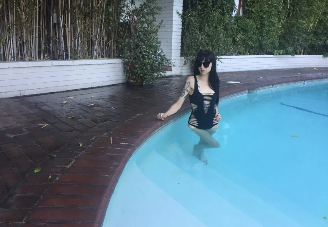 Agent Provocateur suit & a heated pool made for a happy Mistress