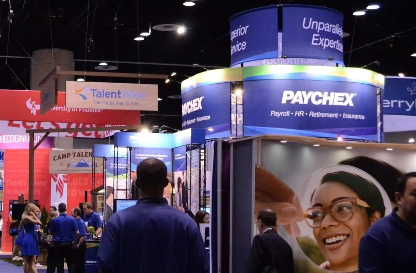 Overhead Signs and Rigging: The “Hidden” Cost of Going Big at a Trade Show