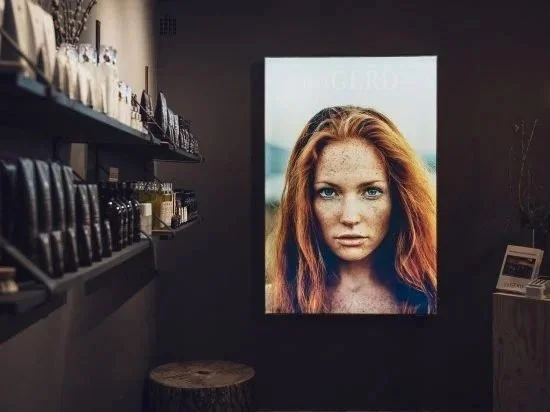Backlit, framed graphics for retail environments