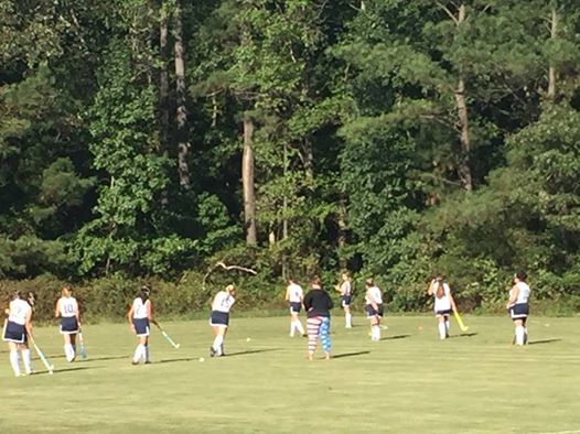 That's me in the American Flag pants during warm ups with the girls. Photo Credit goes to my husband, Jason.