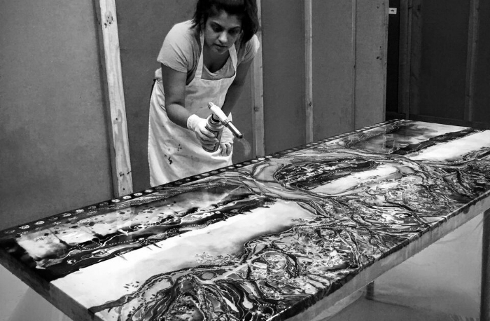 ARTIST STATEMENT Rakhee Jain Desai is a self-taught, multi-disciplinary artist with an advertising and brand planning background. She was born in Canada, raised in the USA and lived in Singapore for nine years. Now back in Texas with her husband and two young daughters, Rakhee’s advertising and market research background influence how she approaches painting as she enjoys studying and integrating social stories and cultural symbols throughout her art. Her Indian heritage and almost a decade spent living in Asia are also evident with her utilisation of vibrant colors, motifs and symbols. Rakhee has worked in clay, armature sculpture, watercolor, oils and wax. Her experience in a variety of medium is apparent as her paintings display dimension, depth and fluidity. Her current body of work uses a multiple step process which includes layers of wax, ink, dyes, fabric, acrylics, oils and epoxy to arrive at her final destination.