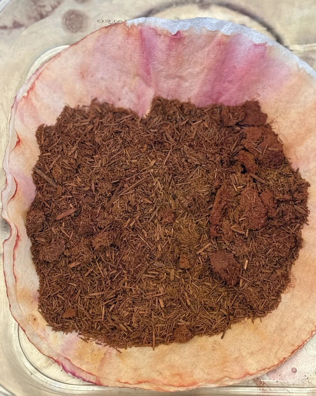 Color is never just color.

It begins as matter. As rind, resin, root, peel, flower. As something held in the hand before it is ever held in cloth.

Pomegranate skins gathered and dried. Cutch shaved into fine splinters. Marigolds collapsed into them