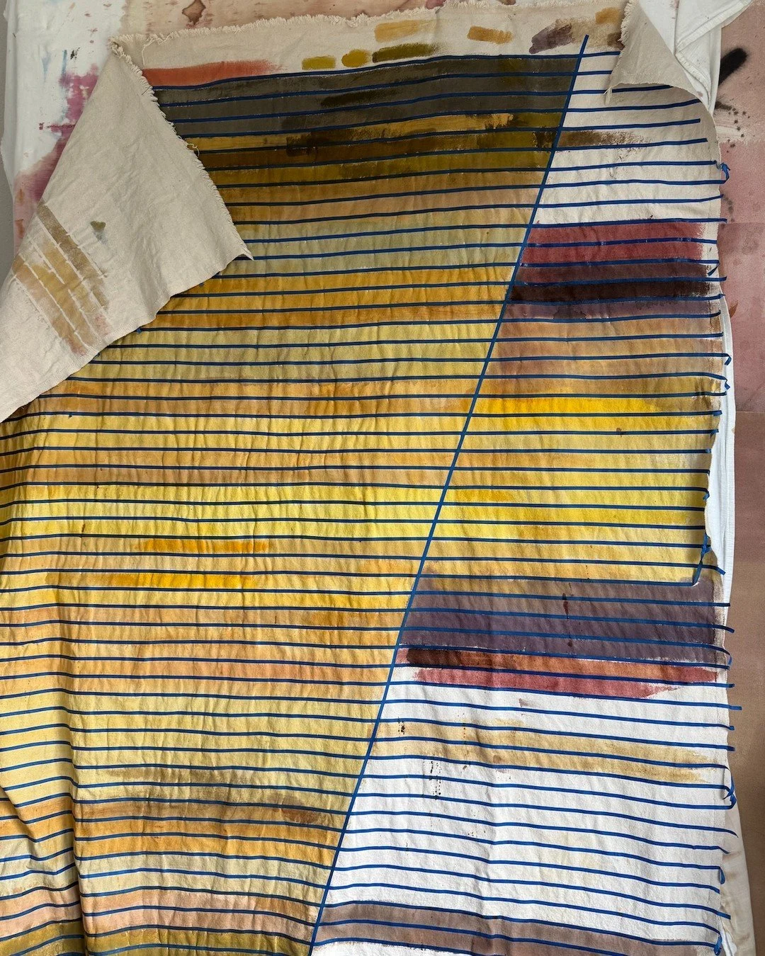 Before the stitching begins, there's a whole conversation happening on paper.

Every seam calculated. Every column of color mapped. The type of stitch, the length, the spacing. It all has to be thought through before a single thread is pulled.

Becau