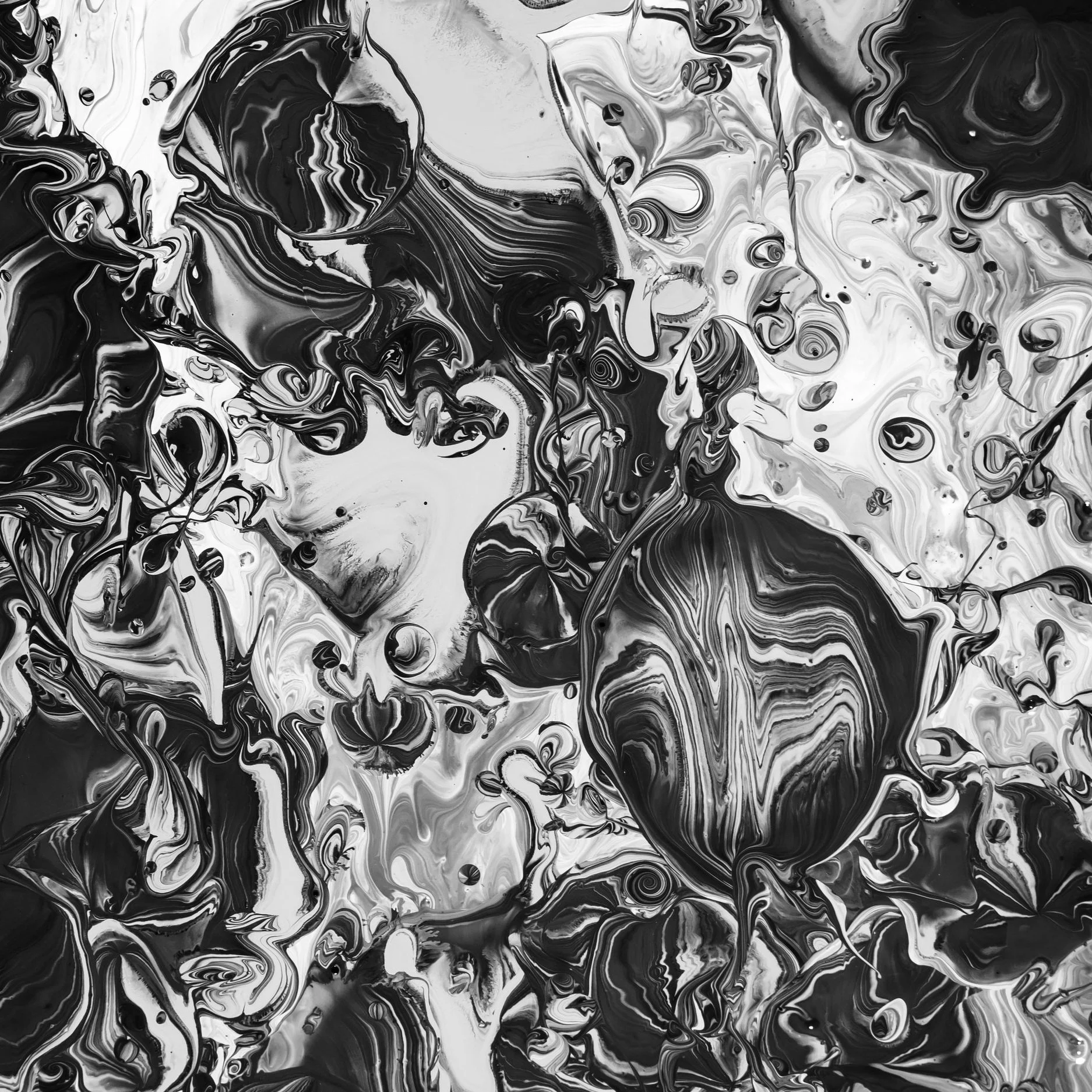 Black and white fluid vortex pattern