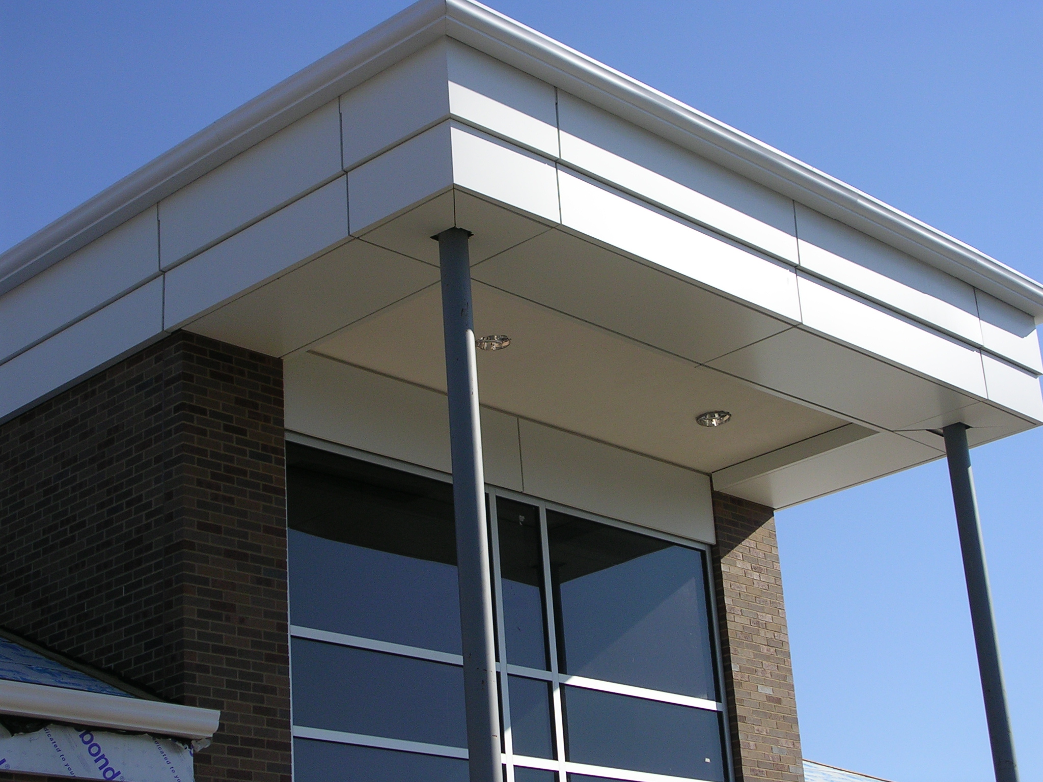  Aluminum Composite Material (ACM), are flat panels consisting of two thin coil-coated  aluminum  sheets bonded to a non- aluminium &nbsp;core. ACM Panels are frequently used for external cladding or facades of buildings, insulation, and signage. 