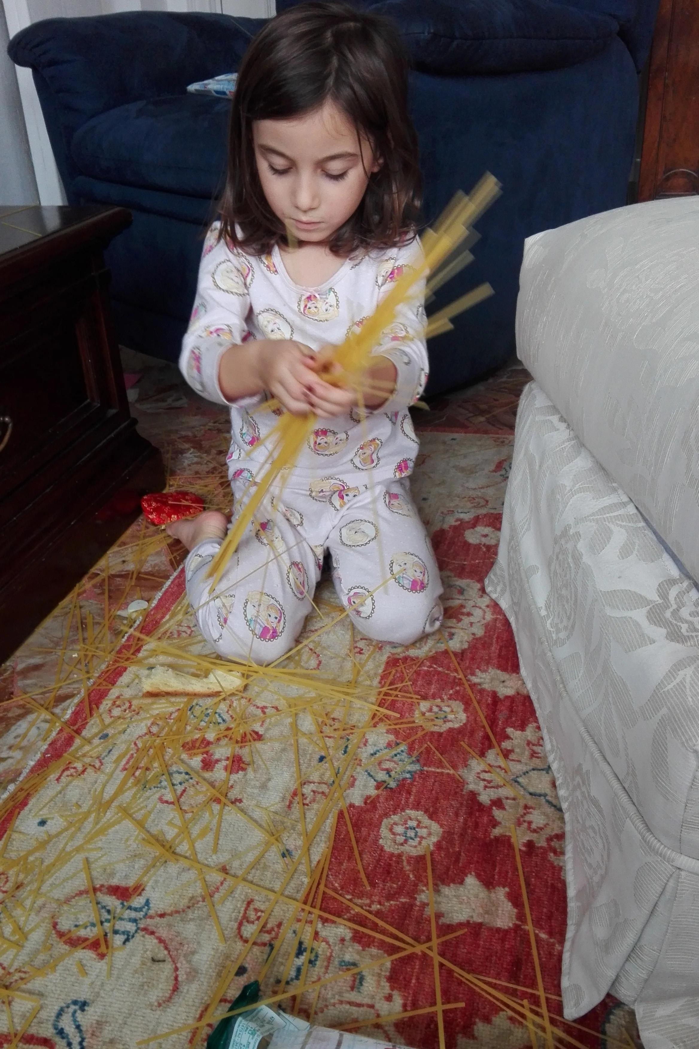 Yes this is spaghetti. Yes it's all over the floor. I'm not sure about the game but I'm sure about the learning. She was very focused and had a purpose. It's not true that four year olds have short attention spans.