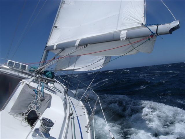 OCC's Catalina 42 Betty, with the first reef tucked in, in the windy lane off Santa Cruz Island during one of the Northern Channel Islands trips