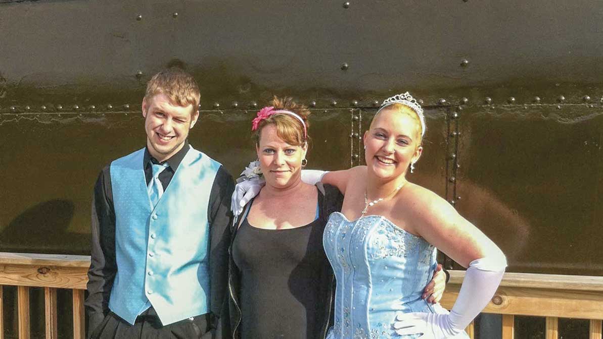  Pictured center is Jolene Bowman with her daughter Sommer, right, and Sommer’s prom date. (Photo provided) 