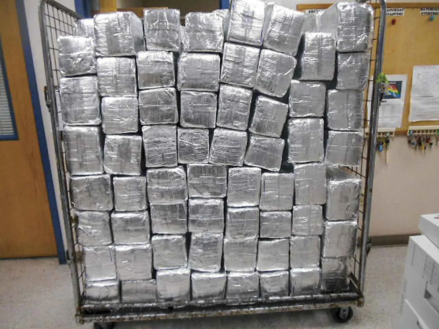 Texas U.S. Customs and Border Protection officers seized over half a ton of alleged marijuana in a commercial shipment of mud floor tiles. Packages containing 1,303 pounds of marijuana were seized. (Photo courtesy of U.S. Customs and Border Protection)