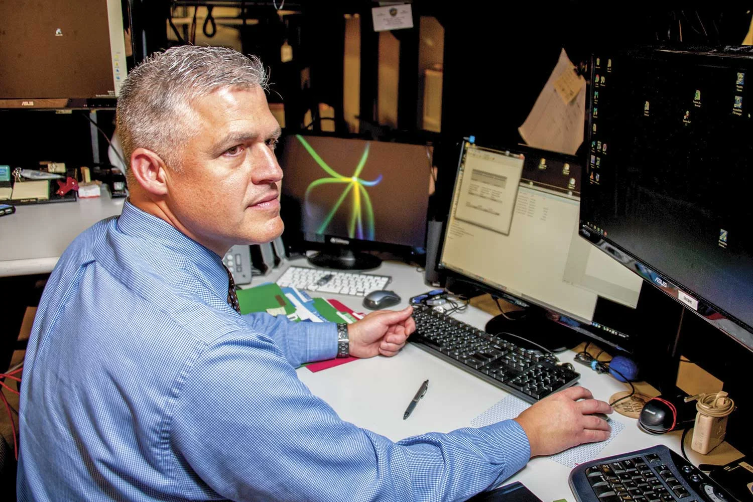 Kentucky State Police Detective Mike Viergutz, is one of two KSP sworn troopers who serve as forensics examiners at the Electronic Crimes Branch. In all, the ECB received 6,351 cyber-tips between 2012 and 2017. (Photo by Jim Robertson)