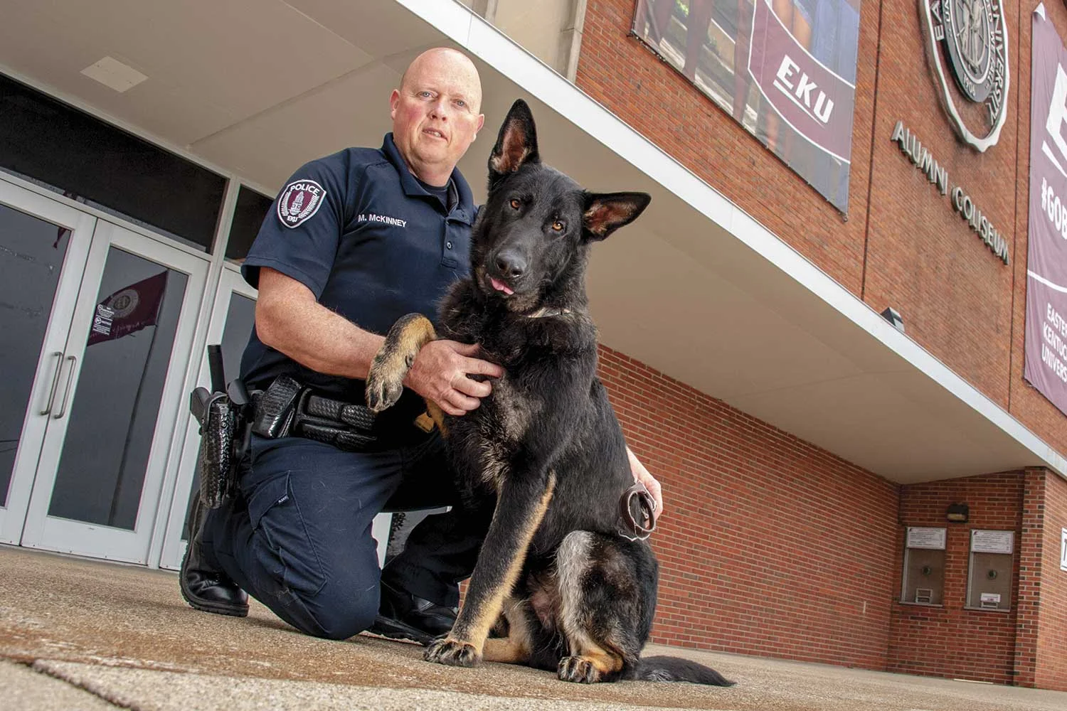 EKUPD Officer Mark McKinney is training Havoc, a 10-month-old German shephard who will be EKU’s first K-9. Havoc will also be Madison County’s first bomb dog. (Photo by Jim Robertson)