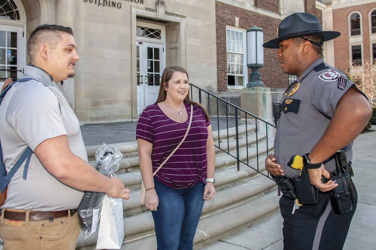 EKUPD Sgt. Tim Gunn talks with students on campus. Good communication with students, administrators and the greater campus community is essential for the police department. (Photo by Jim Robertson)
