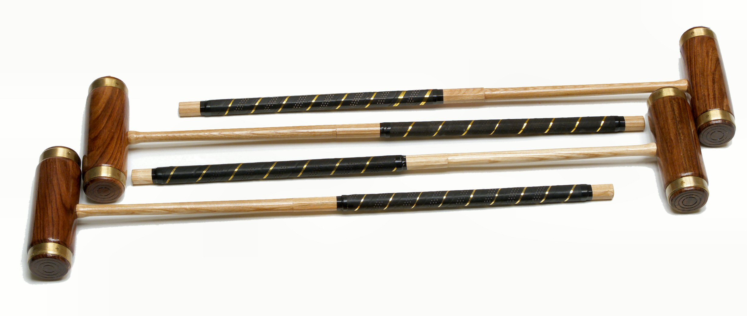 These exquisite croquet mallets from Garden Games feature brass-bound cylindrical heads and are more suited for backyard use.