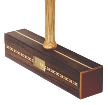 This heirloom-quality, square-headed croquet mallet is custom crafted from Indian Rosewood by British-based artisan Michael Percival .