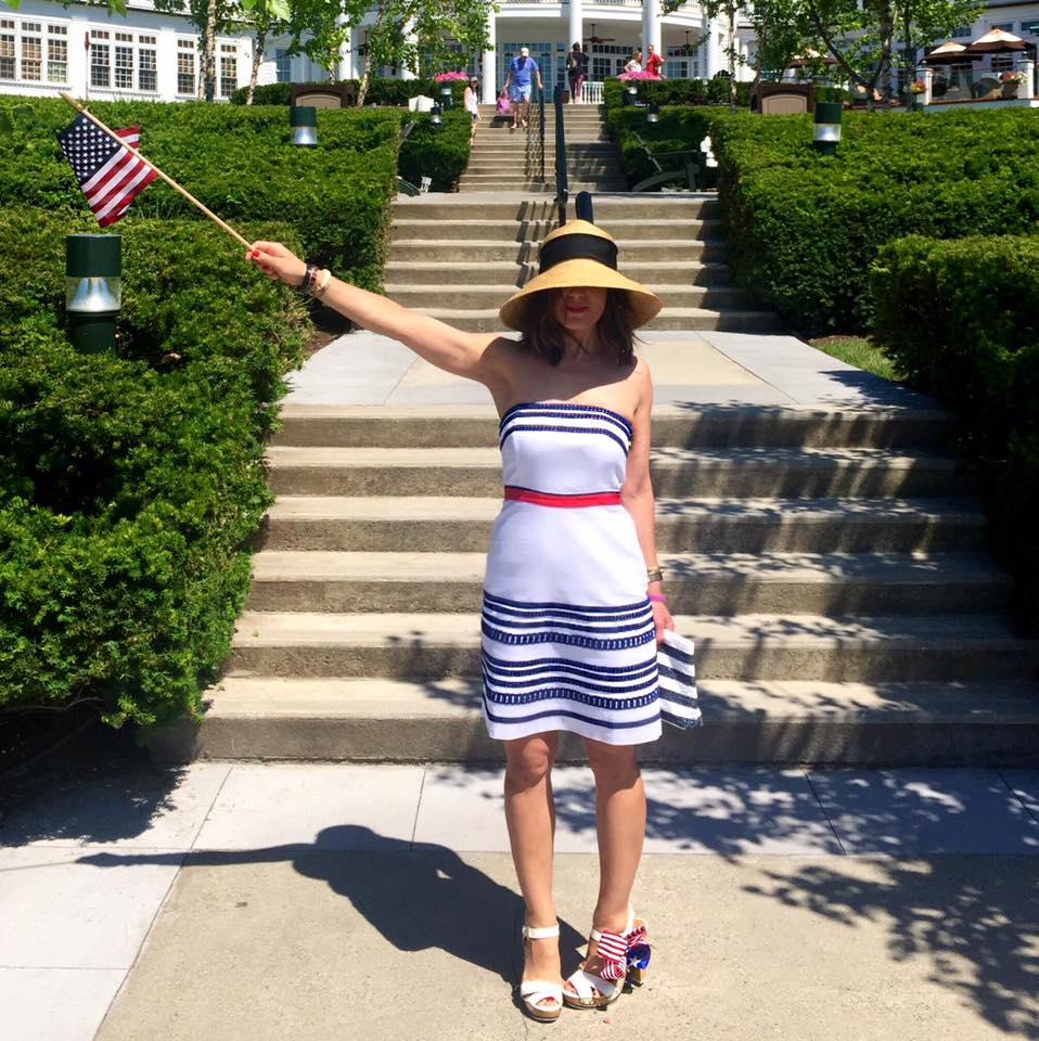 This red, white and blue Vineyard Vines dress was made for celebrating the Fourth of July, and a festive hair-bow dresses up simple strappy sandls.
