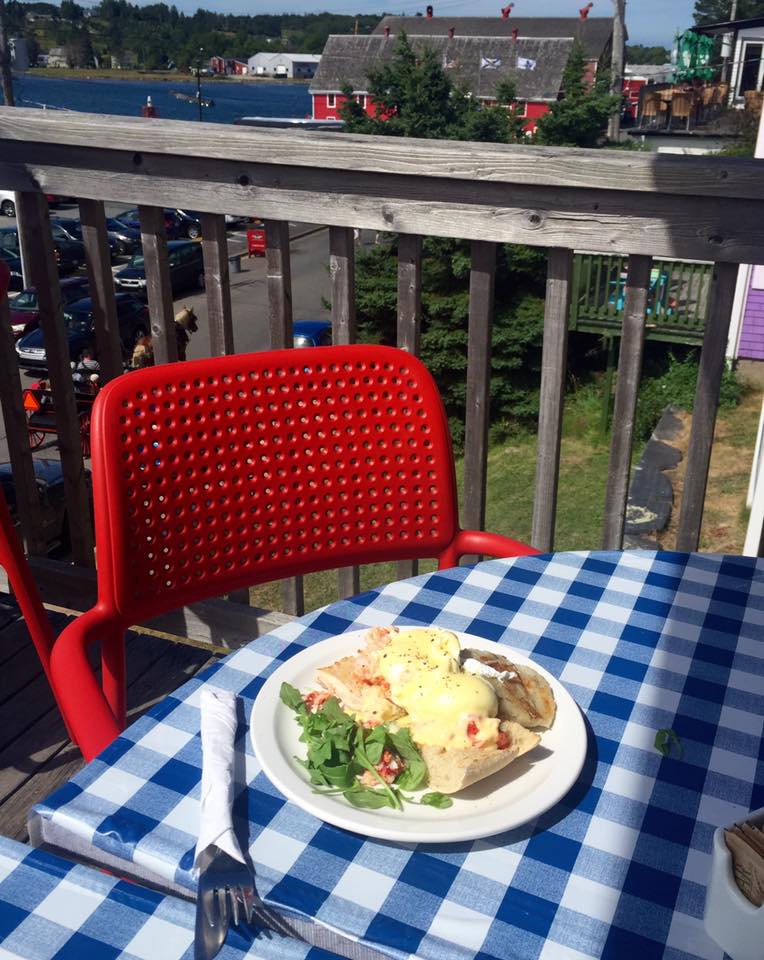 Lobster Benedict is served with an ocean front view at the Savy Sailor in Lunenberg, Nova Scotia.