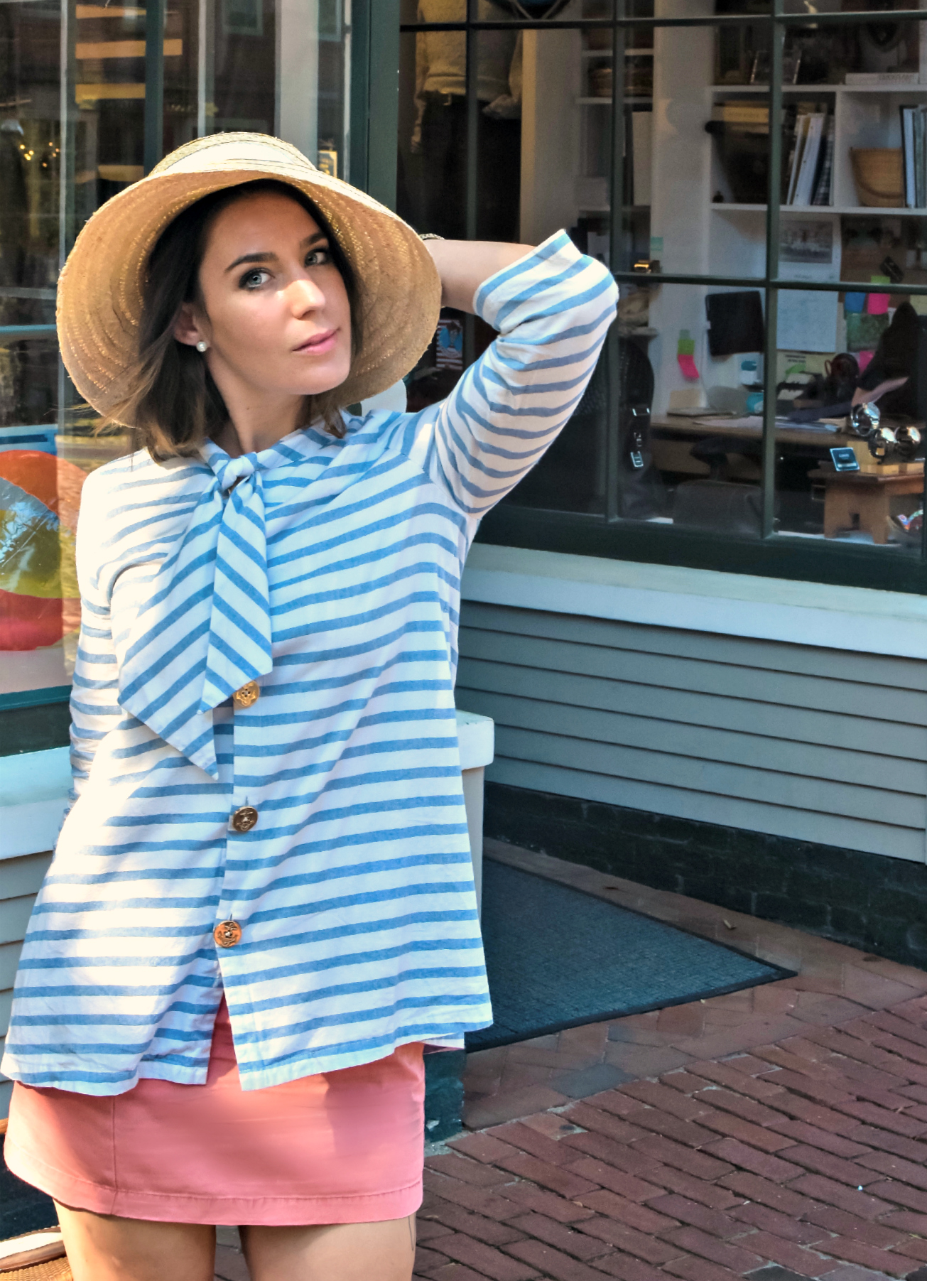 The Nantucket Red Poplin skirt pairs perfectly with a nautical-inspired jacket and raffia straw hat.