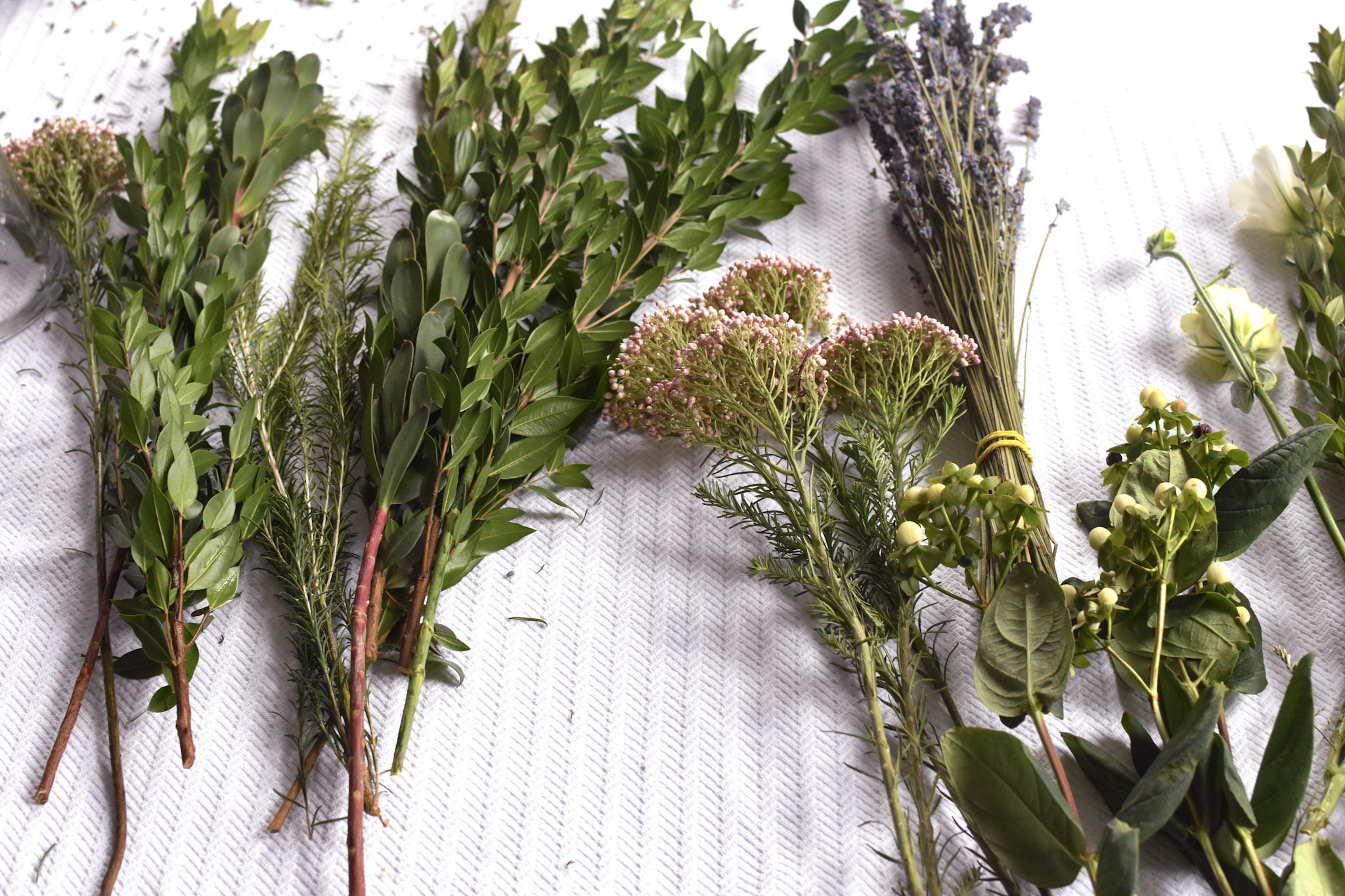From left to right: green myrtle, honey bracelet, pink rice flower, dried lavender and ivory hypericum berries