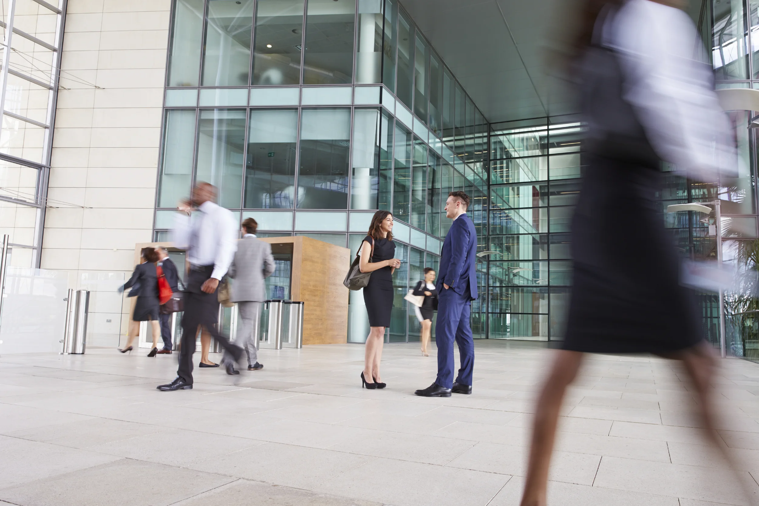 People-passing-through-the-busy-foyer-of-a-business-building-000073538383_Full.jpg